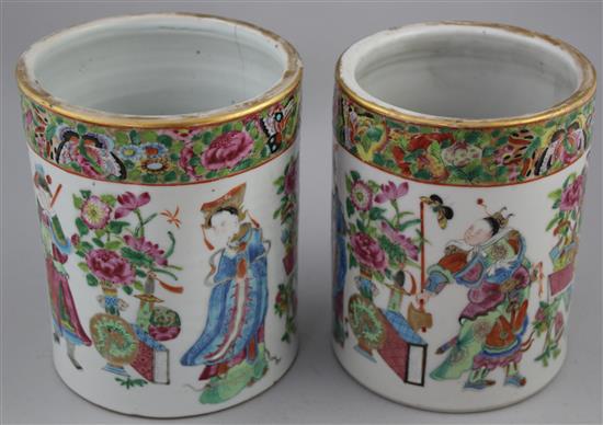 A pair of Chinese Canton-decorated famille rose brush pots, Daoguang period, 16cm, one cracked